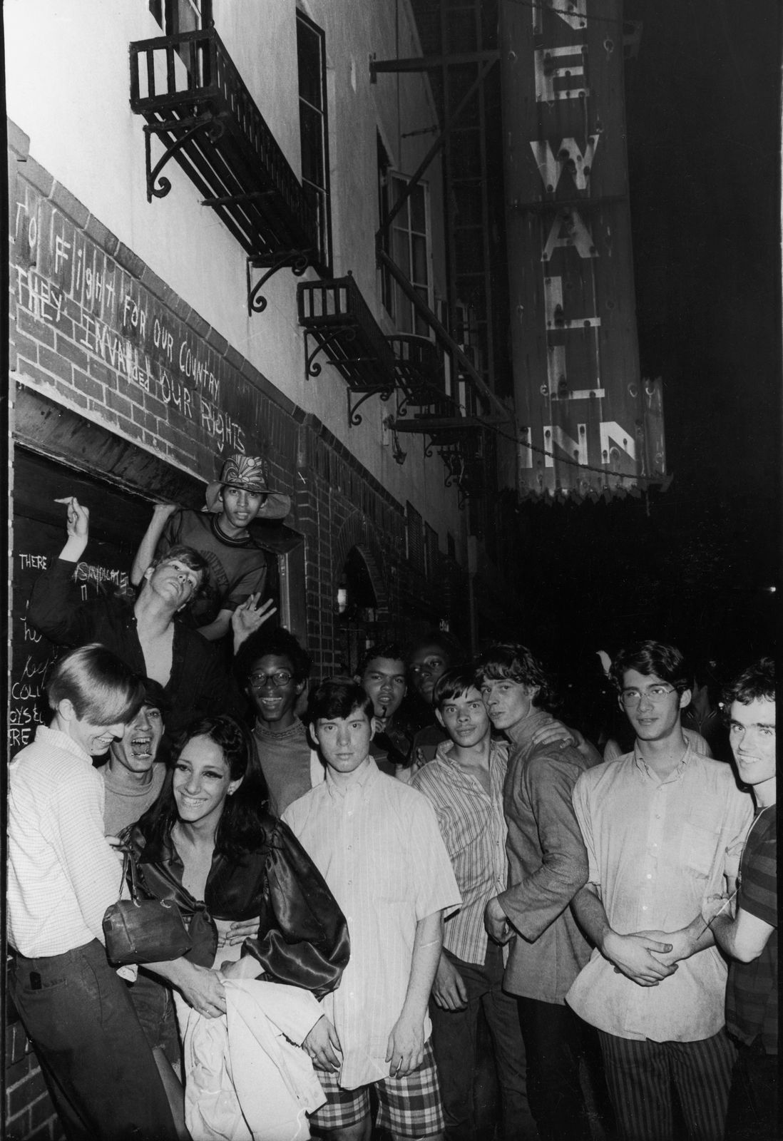 Young people outside the Stonewall Inn, June 28th, 1969